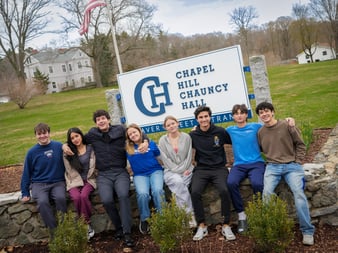 1CHCH Students with School Sign