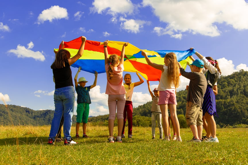 Kids Playing With Parachute